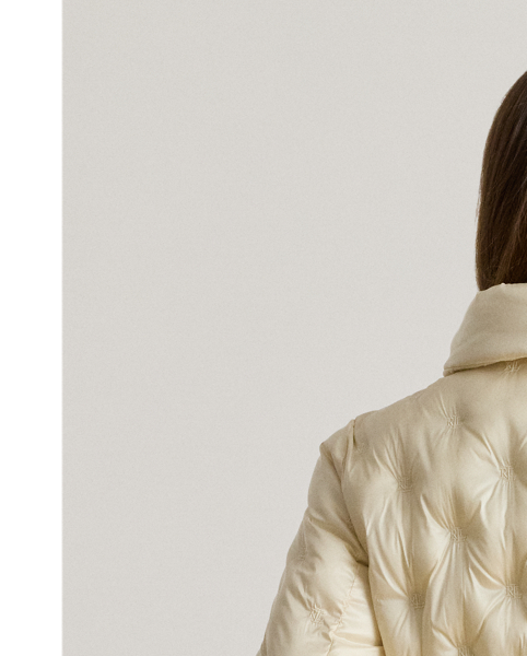 Anchored in sophisticated Lauren  Ralph Lauren Lauren style, this coat is distinguished by diamond quilting with “LRL” tufting throughout. An iridescent finish and a funnelneck add modern appeal, while its insulated puffer silhouette ensures a warm and cosy fit.