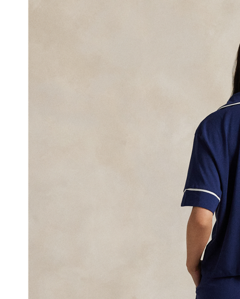 Pairing a short-sleeve shirt with elasticated shorts, this pyjama set is designed with classic piping and embroidered with our iconic Pony. Crafted for year-round versatility and comfort, its stretch cotton-blend fabric was selected for its breathability and soft hand feel, which will only increase with time.