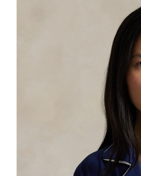 Crafted from a soft cotton blend, this pyjama set comes with a long-sleeved buttoned shirt and full-length trousers. Contrast piped trim and  Ralph Lauren Lauren's signature embroidered Pony complete this classic look.