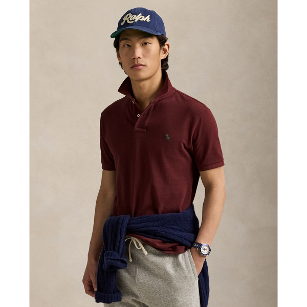 An American style standard since 1972, the Polo shirt has been imitated but never matched. Over the decades,  Ralph Lauren Lauren has re-imagined his signature style in a wide array of colours and fits, yet all retain the quality and attention to detail of the iconic original. This Classic Fit version is made from our highly breathable cotton mesh, which offers a textured look and a soft feel.