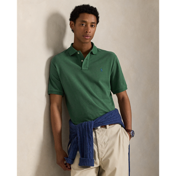 An American style standard since 1972, the Polo shirt has been imitated but never matched. Over the decades, Ralph Lauren Lauren has re-imagined his signature style in a wide array of colours and fits, yet all retain the quality and attention to detail of the iconic original. This Classic Fit version is made from our highly breathable cotton mesh, which offers a textured look and a soft feel.