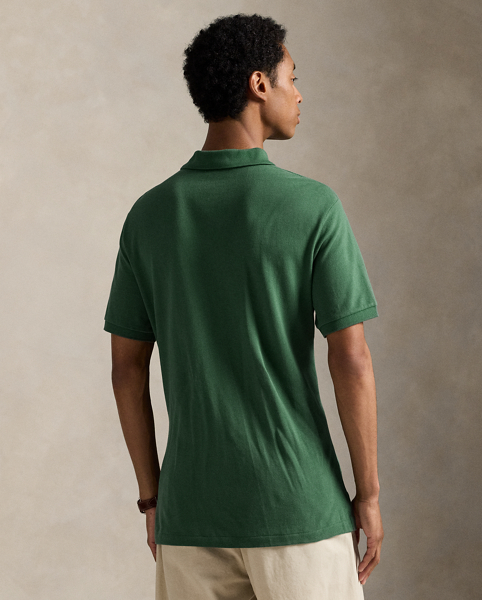 An American style standard since 1972, the Polo shirt has been imitated but never matched. Over the decades, Ralph Lauren Lauren has re-imagined his signature style in a wide array of colours and fits, yet all retain the quality and attention to detail of the iconic original. This Classic Fit version is made from our highly breathable cotton mesh, which offers a textured look and a soft feel.