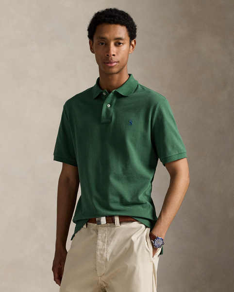 An American style standard since 1972, the Polo shirt has been imitated but never matched. Over the decades, Ralph Lauren Lauren has re-imagined his signature style in a wide array of colours and fits, yet all retain the quality and attention to detail of the iconic original. This Classic Fit version is made from our highly breathable cotton mesh, which offers a textured look and a soft feel.