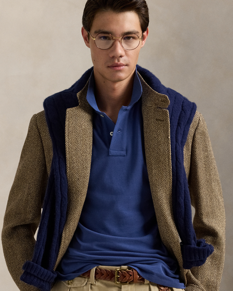 An American style standard since 1972, the Polo shirt has been imitated but never matched. Over the decades, Ralph Lauren Lauren has re-imagined his signature style in a wide array of colours and fits, yet all retain the quality and attention to detail of the iconic original. This Classic Fit version is made from our highly breathable cotton mesh, which offers a textured look and a soft feel.