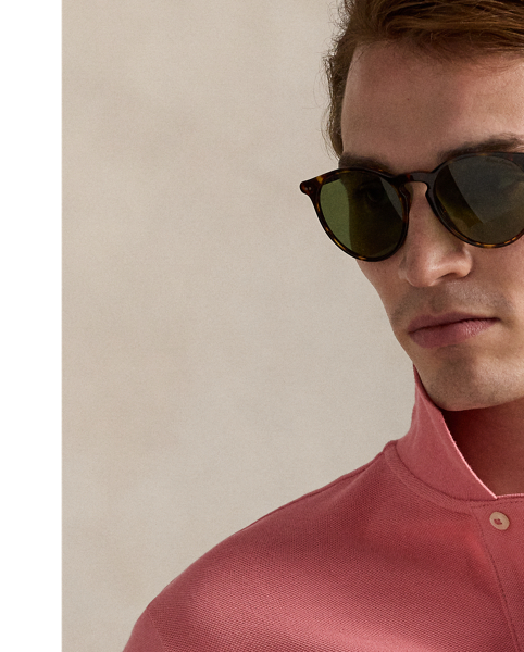 An American style standard since 1972, the Polo shirt has been imitated but never matched. Over the decades,  Ralph Lauren Lauren has re-imagined his signature style in a wide array of colours and fits, yet all retain the quality and attention to detail of the iconic original. This Classic Fit version is made from our highly breathable cotton mesh, which offers a textured look and a soft feel.