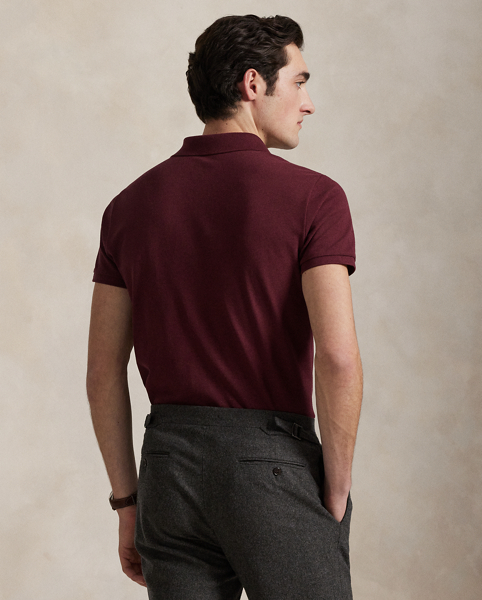 An American style standard since 1972, the Polo shirt has been imitated but never matched. Over the decades, Ralph Lauren Lauren has re-imagined his signature style in a wide array of colours and fits, yet all retain the quality and attention to detail of the iconic original. This version is made from our highly breathable cotton mesh, which offers a textured look and a soft feel.