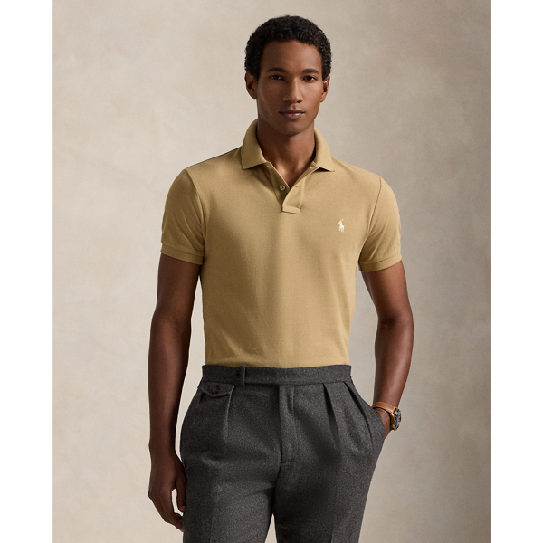 An American style standard since 1972, the Polo shirt has been imitated but never matched. Over the decades, Ralph Lauren Lauren has re-imagined his signature style in a wide array of colours and fits, yet all retain the quality and attention to detail of the iconic original. This version is made from our highly breathable cotton mesh, which offers a textured look and a soft feel.