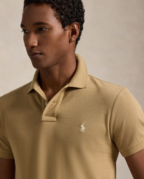 An American style standard since 1972, the Polo shirt has been imitated but never matched. Over the decades, Ralph Lauren Lauren has re-imagined his signature style in a wide array of colours and fits, yet all retain the quality and attention to detail of the iconic original. This version is made from our highly breathable cotton mesh, which offers a textured look and a soft feel.