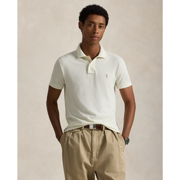 An American style standard since 1972, the Polo shirt has been imitated but never matched. Over the decades, Ralph Lauren Lauren has re-imagined his signature style in a wide array of colours and fits, yet all retain the quality and attention to detail of the iconic original. This version is made from our highly breathable cotton mesh, which offers a textured look and a soft feel.