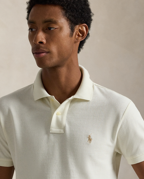 An American style standard since 1972, the Polo shirt has been imitated but never matched. Over the decades, Ralph Lauren Lauren has re-imagined his signature style in a wide array of colours and fits, yet all retain the quality and attention to detail of the iconic original. This version is made from our highly breathable cotton mesh, which offers a textured look and a soft feel.