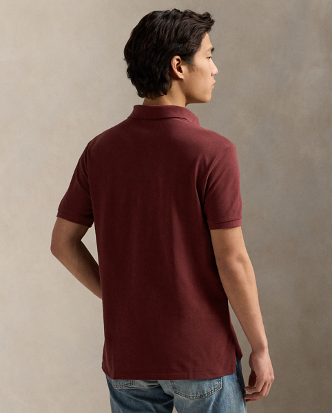 An American style standard since 1972, the Polo shirt has been imitated but never matched. Over the decades, Ralph Lauren Lauren has re-imagined his signature style in a wide array of colours and fits, yet all retain the quality and attention to detail of the iconic original. This version is made from our highly breathable cotton mesh, which offers a textured look and a soft feel.