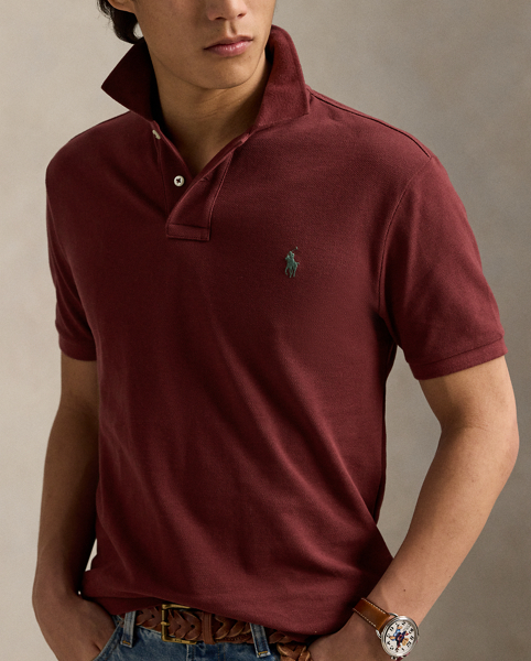 An American style standard since 1972, the Polo shirt has been imitated but never matched. Over the decades, Ralph Lauren Lauren has re-imagined his signature style in a wide array of colours and fits, yet all retain the quality and attention to detail of the iconic original. This version is made from our highly breathable cotton mesh, which offers a textured look and a soft feel.