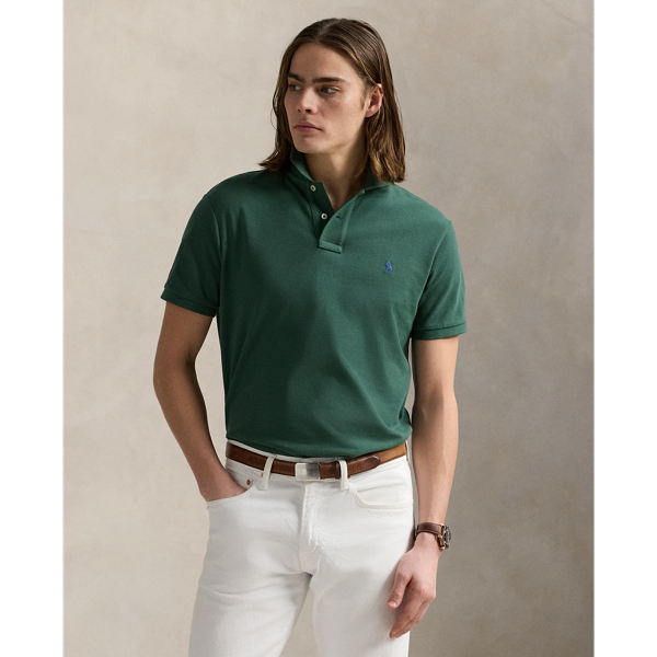An American style standard since 1972, the Polo shirt has been imitated but never matched. Over the decades, Ralph Lauren Lauren has re-imagined his signature style in a wide array of colours and fits, yet all retain the quality and attention to detail of the iconic original. This version is made from our highly breathable cotton mesh, which offers a textured look and a soft feel.