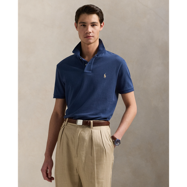 An American style standard since 1972, the Polo shirt has been imitated but never matched. Over the decades,  Ralph Lauren Lauren has re-imagined his signature style in a wide array of colours and fits, yet all retain the quality and attention to detail of the iconic original. This version is made from our highly breathable cotton mesh, which offers a textured look and a soft feel.