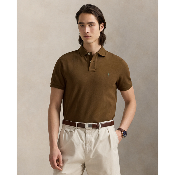 An American style standard since 1972, the Polo shirt has been imitated but never matched. Over the decades, Ralph Lauren Lauren has re-imagined his signature style in a wide array of colours and fits, yet all retain the quality and attention to detail of the iconic original. This version is made from our highly breathable cotton mesh, which offers a textured look and a soft feel.