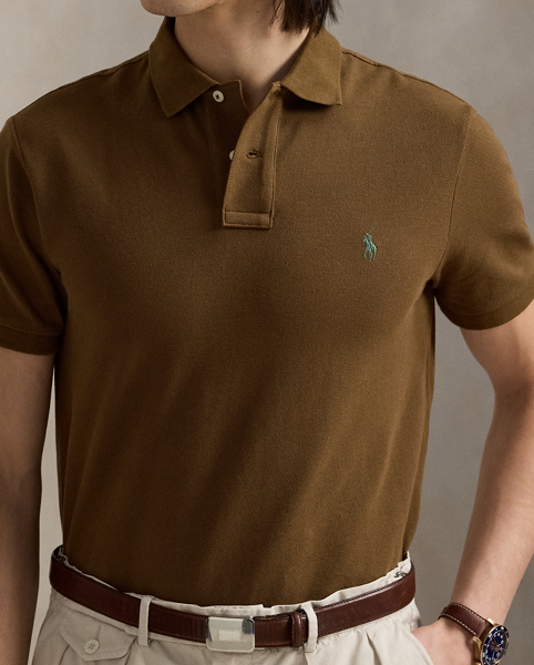 An American style standard since 1972, the Polo shirt has been imitated but never matched. Over the decades, Ralph Lauren Lauren has re-imagined his signature style in a wide array of colours and fits, yet all retain the quality and attention to detail of the iconic original. This version is made from our highly breathable cotton mesh, which offers a textured look and a soft feel.