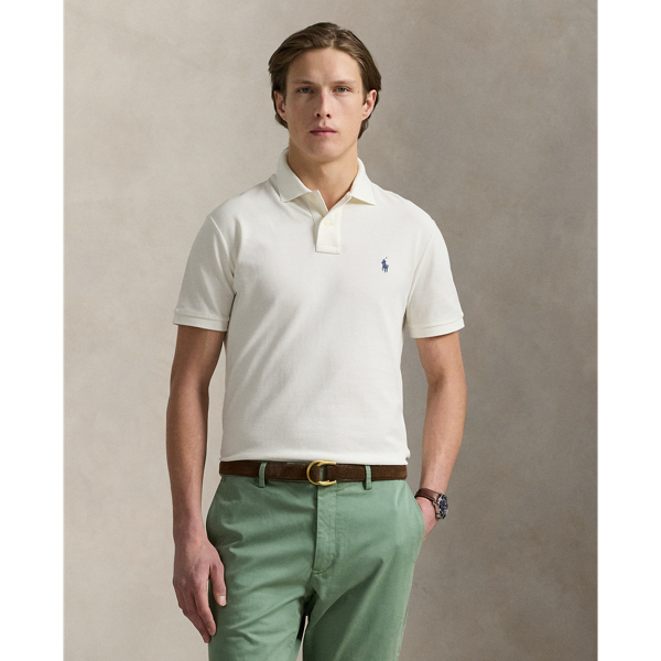 An American style standard since 1972, the Polo shirt has been imitated but never matched. Over the decades, Ralph Lauren Lauren has re-imagined his signature style in a wide array of colours and fits, yet all retain the quality and attention to detail of the iconic original. This version is made from our highly breathable cotton mesh, which offers a textured look and a soft feel.