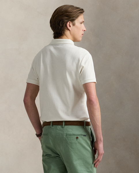 An American style standard since 1972, the Polo shirt has been imitated but never matched. Over the decades, Ralph Lauren Lauren has re-imagined his signature style in a wide array of colours and fits, yet all retain the quality and attention to detail of the iconic original. This version is made from our highly breathable cotton mesh, which offers a textured look and a soft feel.