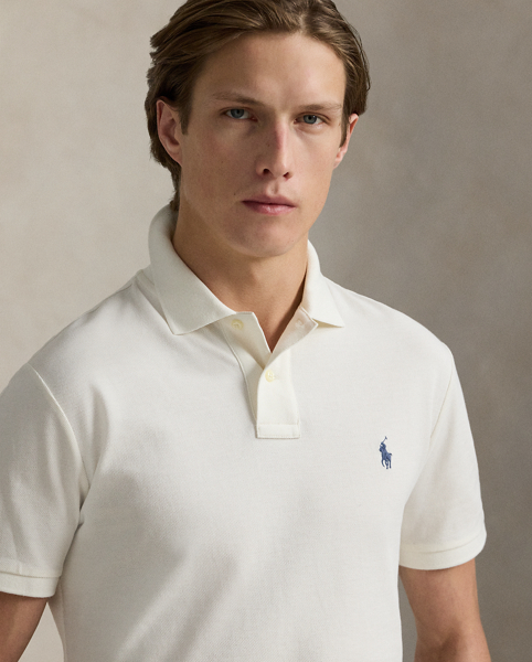 An American style standard since 1972, the Polo shirt has been imitated but never matched. Over the decades, Ralph Lauren Lauren has re-imagined his signature style in a wide array of colours and fits, yet all retain the quality and attention to detail of the iconic original. This version is made from our highly breathable cotton mesh, which offers a textured look and a soft feel.