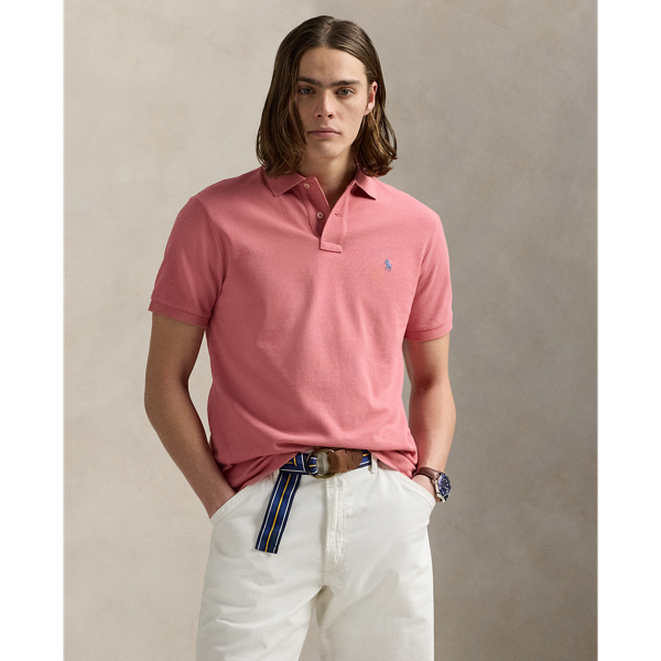 An American style standard since 1972, the Polo shirt has been imitated but never matched. Over the decades, Ralph Lauren Lauren has re-imagined his signature style in a wide array of colours and fits, yet all retain the quality and attention to detail of the iconic original. This version is made from our highly breathable cotton mesh, which offers a textured look and a soft feel.