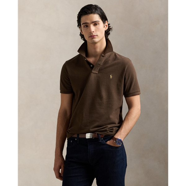 An American style standard since 1972, the Polo shirt has been imitated but never matched. Over the decades, Ralph Lauren Lauren has re-imagined his signature style in a wide array of colours and fits, yet all retain the quality and attention to detail of the iconic original. This version is made from our highly breathable cotton mesh, which offers a textured look and a soft feel.