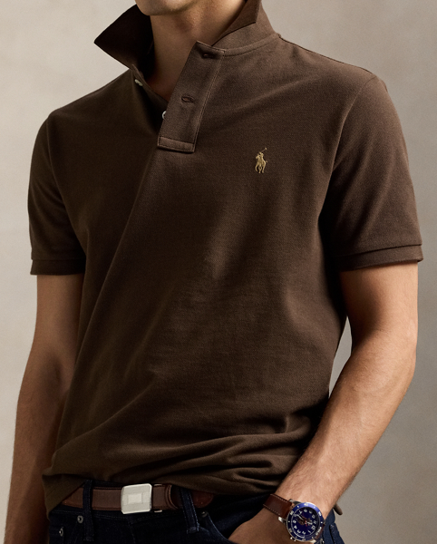 An American style standard since 1972, the Polo shirt has been imitated but never matched. Over the decades, Ralph Lauren Lauren has re-imagined his signature style in a wide array of colours and fits, yet all retain the quality and attention to detail of the iconic original. This version is made from our highly breathable cotton mesh, which offers a textured look and a soft feel.