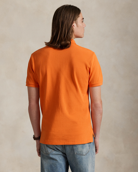 An American style standard since 1972, the Polo shirt has been imitated but never matched. Over the decades, Ralph Lauren Lauren has re-imagined his signature style in a wide array of colours and fits, yet all retain the quality and attention to detail of the iconic original. This version is made from our highly breathable cotton mesh, which offers a textured look and a soft feel.