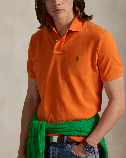 An American style standard since 1972, the Polo shirt has been imitated but never matched. Over the decades, Ralph Lauren Lauren has re-imagined his signature style in a wide array of colours and fits, yet all retain the quality and attention to detail of the iconic original. This version is made from our highly breathable cotton mesh, which offers a textured look and a soft feel.