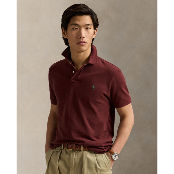 An American style standard since 1972, the Polo shirt has been imitated but never matched. Over the decades,  Ralph Lauren Lauren has re-imagined his signature style in a wide array of colours and fits, yet all retain the quality and attention to detail of the iconic original. This trim version is made from our highly breathable cotton mesh, which offers a textured look and a soft feel.