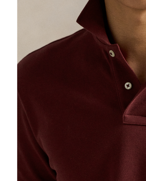 An American style standard since 1972, the Polo shirt has been imitated but never matched. Over the decades,  Ralph Lauren Lauren has re-imagined his signature style in a wide array of colours and fits, yet all retain the quality and attention to detail of the iconic original. This trim version is made from our highly breathable cotton mesh, which offers a textured look and a soft feel.