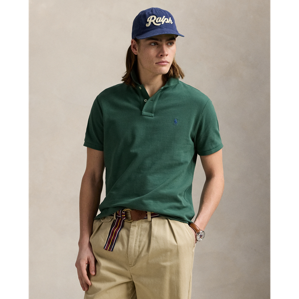 An American style standard since 1972, the Polo shirt has been imitated but never matched. Over the decades,  Ralph Lauren Lauren has re-imagined his signature style in a wide array of colours and fits, yet all retain the quality and attention to detail of the iconic original. This trim version is made from our highly breathable cotton mesh, which offers a textured look and a soft feel.