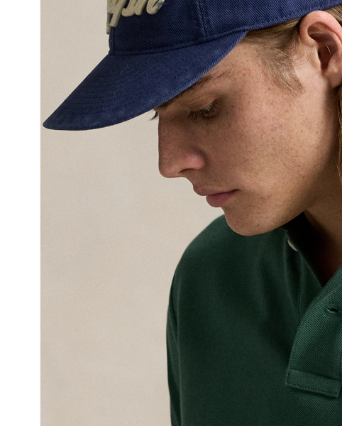 An American style standard since 1972, the Polo shirt has been imitated but never matched. Over the decades,  Ralph Lauren Lauren has re-imagined his signature style in a wide array of colours and fits, yet all retain the quality and attention to detail of the iconic original. This trim version is made from our highly breathable cotton mesh, which offers a textured look and a soft feel.