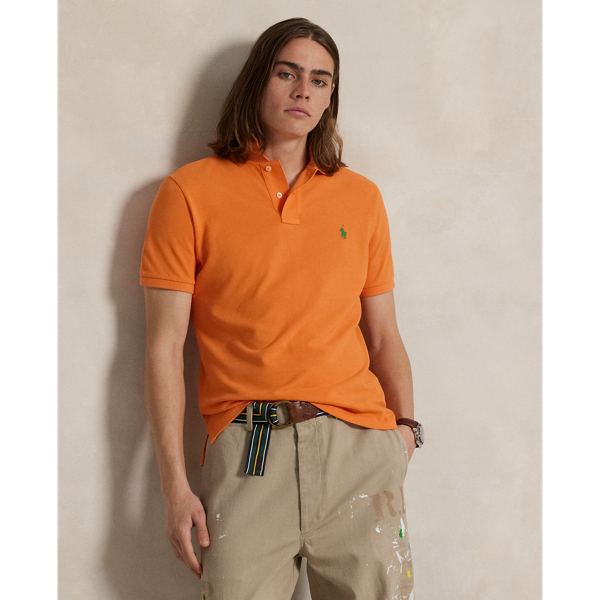 An American style standard since 1972, the Polo shirt has been imitated but never matched. Over the decades, Ralph Lauren Lauren has re-imagined his signature style in a wide array of colours and fits, yet all retain the quality and attention to detail of the iconic original. This trim version is made from our highly breathable cotton mesh, which offers a textured look and a soft feel.