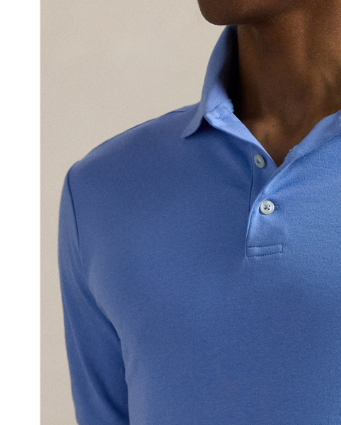 An American style standard since 1972, the Polo shirt has been imitated but never matched. Over the decades,  Ralph Lauren Lauren has re-imagined his signature style in a wide array of colours and fits, yet all retain the quality and attention to detail of the iconic original. This trim version is made from luxe cotton interlock, which features an ultra-soft finish.
