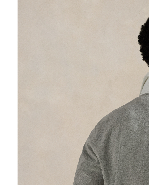 With its athletic details and timeless design, The Iconic Rugby Shirt captures the preppy yet sporty sensibility that has long defined the Polo  Ralph Lauren Lauren brand. This version features all the hallmarks of a traditional rugby shirt – the white point collar, concealed placket, rubber buttons and rib-knit cuffs. Made from durable cotton jersey that stays true to the sport's rough-and-tumble heritage, this shirt will stand up to repeated wear on and off the field of play.