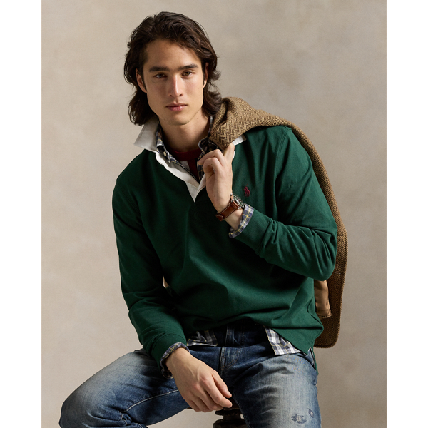 With its athletic details and timeless design, The Iconic Rugby Shirt captures the preppy yet sporty sensibility that has long defined the Polo Ralph Lauren Lauren brand. This version features all the hallmarks of a traditional rugby shirt – the white point collar, concealed placket, rubber buttons and rib-knit cuffs. Made from durable cotton jersey that stays true to the sport's rough-and-tumble heritage, this shirt will stand up to repeated wear on and off the field of play.