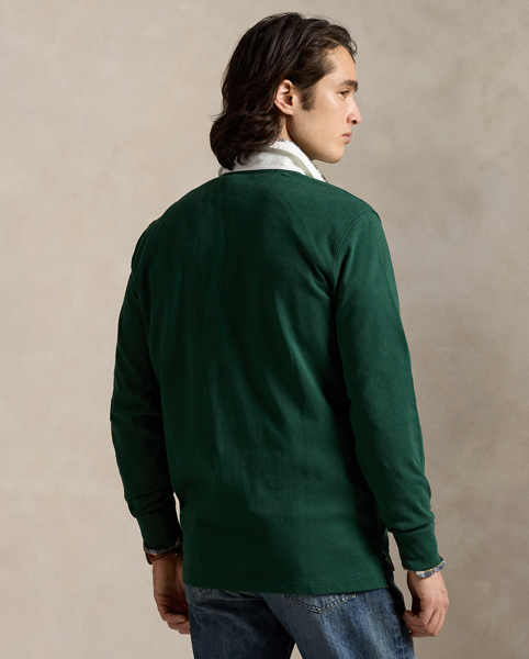 With its athletic details and timeless design, The Iconic Rugby Shirt captures the preppy yet sporty sensibility that has long defined the Polo Ralph Lauren Lauren brand. This version features all the hallmarks of a traditional rugby shirt – the white point collar, concealed placket, rubber buttons and rib-knit cuffs. Made from durable cotton jersey that stays true to the sport's rough-and-tumble heritage, this shirt will stand up to repeated wear on and off the field of play.