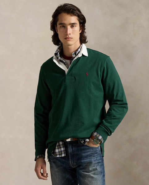 With its athletic details and timeless design, The Iconic Rugby Shirt captures the preppy yet sporty sensibility that has long defined the Polo Ralph Lauren Lauren brand. This version features all the hallmarks of a traditional rugby shirt – the white point collar, concealed placket, rubber buttons and rib-knit cuffs. Made from durable cotton jersey that stays true to the sport's rough-and-tumble heritage, this shirt will stand up to repeated wear on and off the field of play.