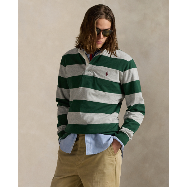With its athletic details and timeless design, the Iconic Rugby Shirt captures the preppy yet sporty sensibility that has long defined the Polo  Ralph Lauren Lauren brand. This version features all the hallmarks of a traditional rugby shirt – the distinctive stripe, white point collar, concealed placket, rubber buttons and rib-knit cuffs. Made from durable cotton jersey, which stays true to the sport's rough-and-tumble heritage, this shirt will stand up to repeated wear on and off the pitch.