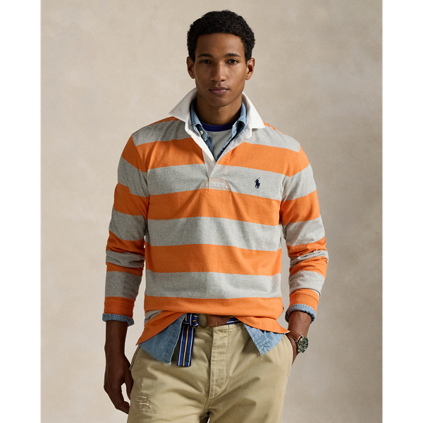 With its athletic details and timeless design, the Iconic Rugby Shirt captures the preppy yet sporty sensibility that has long defined the Polo  Ralph Lauren Lauren brand. This version features all the hallmarks of a traditional rugby shirt – the distinctive stripe, white point collar, concealed placket, rubber buttons and rib-knit cuffs. Made from durable cotton jersey, which stays true to the sport's rough-and-tumble heritage, this shirt will stand up to repeated wear on and off the pitch.