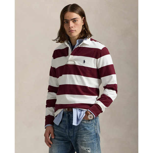 With its athletic details and timeless design, the Iconic Rugby Shirt captures the preppy yet sporty sensibility that has long defined the Polo Ralph Lauren Lauren brand. This version features all the hallmarks of a traditional rugby shirt – the distinctive stripe, white point collar, concealed placket, rubber buttons and rib-knit cuffs. Made from durable cotton jersey, which stays true to the sport's rough-and-tumble heritage, this shirt will stand up to repeated wear on and off the pitch.