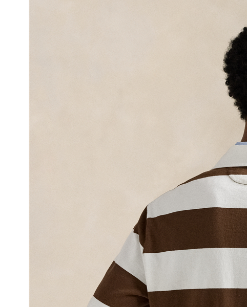 With its athletic details and timeless design, the Iconic Rugby Shirt captures the preppy yet sporty sensibility that has long defined the Polo  Ralph Lauren Lauren brand. This version features all the hallmarks of a traditional rugby shirt – the distinctive stripe, white point collar, concealed placket, rubber buttons and rib-knit cuffs. Made from durable cotton jersey, which stays true to the sport's rough-and-tumble heritage, this shirt will stand up to repeated wear on and off the pitch.