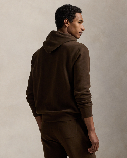 Perfect for teaming with tracksuit wear, jeans or shorts, this cotton-blend hoodie is sure to become a well-loved piece.