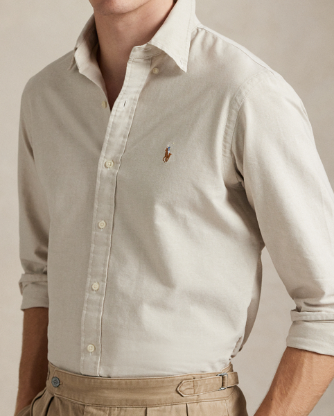 The oxford shirt made its debut at the beginning of the Ralph Lauren Lauren brand, and since then it has solidified its status as a pillar of the Polo look. Today, Mr. Lauren continues to design countless variations of his iconic shirt, including this trim version that is finished with our multicoloured signature Pony.