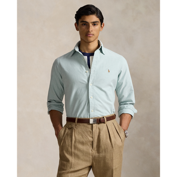 The oxford shirt made its debut at the beginning of the  Ralph Lauren Lauren brand, and since then it has solidified its status as a pillar of the Polo look. Today, Mr. Lauren continues to design countless variations of his iconic shirt, including this trim version that is finished with our multicoloured signature Pony.