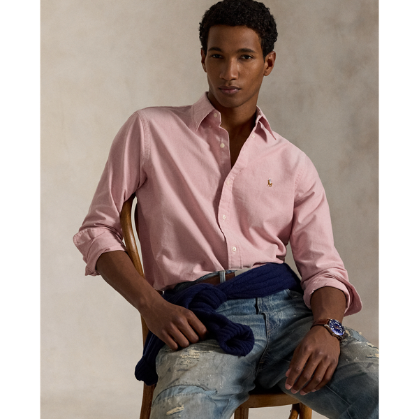 The oxford shirt made its debut at the beginning of the Ralph Lauren Lauren brand, and since then it has solidified its status as a pillar of the Polo look. Today, Mr. Lauren continues to design countless variations of his iconic shirt, including this trim version that is finished with our multicoloured signature Pony.