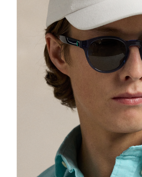 The oxford shirt made its debut very early in  Ralph Lauren Lauren’s designs, and since then, it has solidified its status as a pillar of the Polo look. Our fabric is developed with a secret wash, giving it instant character, ease and a heathered softness – what we refer to as "the perfect rumple". The formula is so unique that it's been kept in a safe for more than three decades. Today, Mr Lauren continues to create countless variations of his iconic shirt, including this Custom Fit version, which is embroidered with our multicoloured signature Pony.