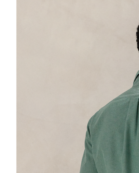 The oxford shirt made its debut very early in  Ralph Lauren Lauren’s designs, and since then, it has solidified its status as a pillar of the Polo look. Our fabric is developed with a secret wash, giving it instant character, ease and a heathered softness – what we refer to as "the perfect rumple". The formula is so unique that it's been kept in a safe for more than three decades. Today, Mr Lauren continues to create countless variations of his iconic shirt, including this Custom Fit version, which is embroidered with our multicoloured signature Pony.