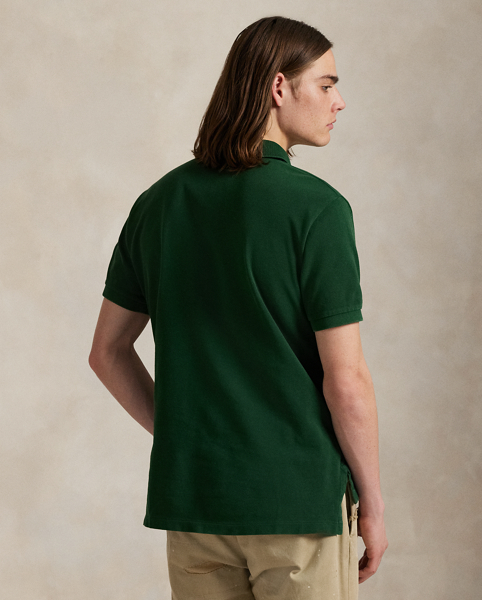 An American style standard since 1972, the Polo shirt has been imitated but never matched. Over the decades, Ralph Lauren Lauren has re-imagined his signature style in a wide array of colours and fits, yet all retain the quality and attention to detail of the initial icon. Treated for a timeworn look, this version is cut in our Original Fit, which is slightly more relaxed on the shoulder than our Classic Fit and has a longer back length.