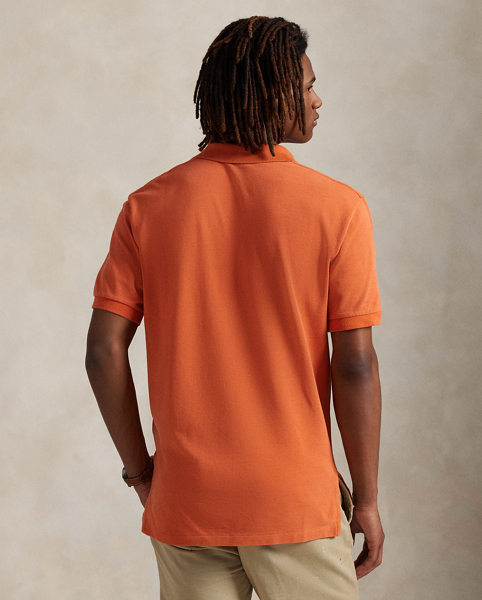 An American style standard since 1972, the Polo shirt has been imitated but never matched. Over the decades, Ralph Lauren Lauren has re-imagined his signature style in a wide array of colours and fits, yet all retain the quality and attention to detail of the initial icon. Treated for a timeworn look, this version is cut in our Original Fit, which is slightly more relaxed on the shoulder than our Classic Fit and has a longer back length.